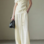 Textured off-shoulder fitted top with side pleats, loose pleated wide-leg pants two-piece set - liwisi