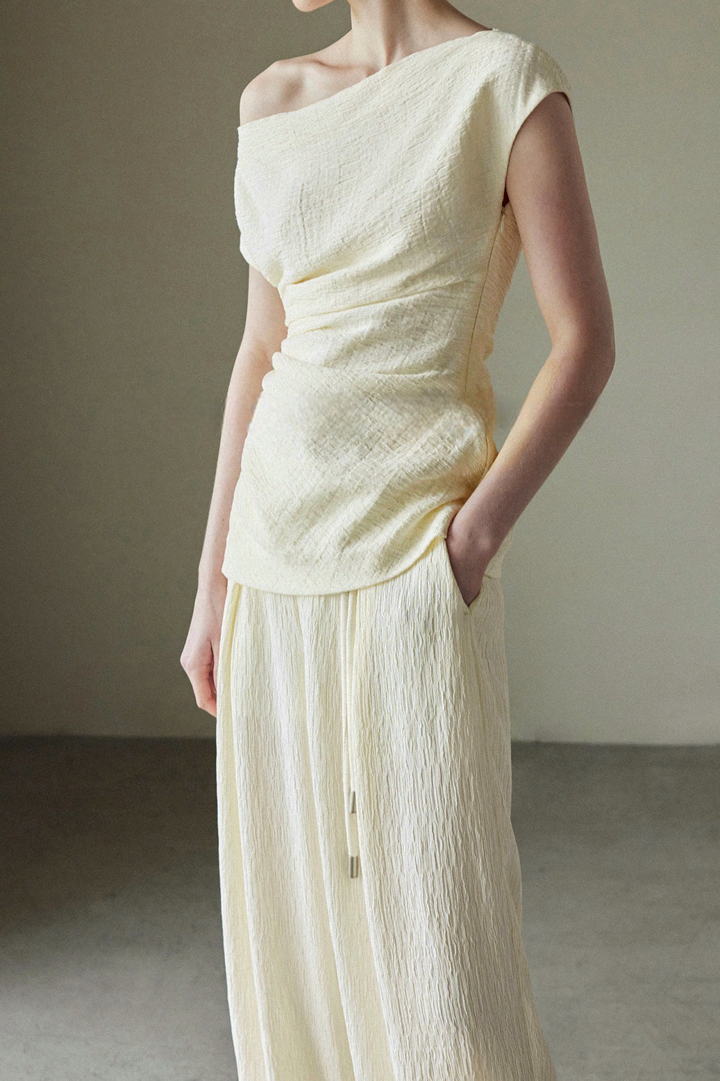 Textured off-shoulder fitted top with side pleats, loose pleated wide-leg pants two-piece set - liwisi