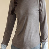 Knitted sweater in fake two-piece style with color-blocking splicing