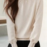 Elegant Knit Sweater With Ruffled Mock Neck And Bead Embellishment