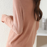 V-neck knitted sweater with hot-fixed rhinestones.