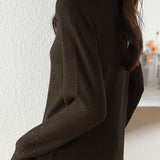 V-neck knitted sweater with hot-fixed rhinestones.