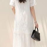 Elegant Pleated Dress With Hollow Embroidery And Tassels