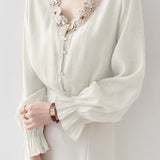 Elegant Lace Floral Flare‑Sleeve V‑Neck Blouse