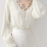 Elegant Lace Floral Flare‑Sleeve V‑Neck Blouse