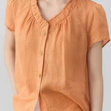 Casual V-neck gathered loose shirt.