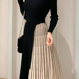 Elegant Paneled Sweater Dress