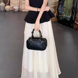 Elegant Mature Two-Piece Set: Sleeveless Top & Black-White Midi Skirt