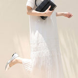 Elegant Pleated Dress With Hollow Embroidery And Tassels