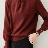 Elegant Knit Sweater With Ruffled Mock Neck And Bead Embellishment