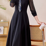 Elegant Commuter V‑Neck Printed Long‑Sleeve Dress With Ribbon And Mesh Splicing