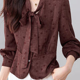 French Commuter V‑Neck Long‑Sleeve Blouse With Tie Detail And Polka‑Dot Print