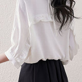 Solid color ruffle edge shirt