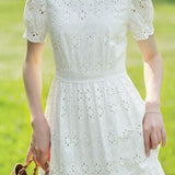 Solid color round neck hollow dress