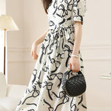 V-neck bow tie printed dress