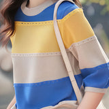 Three-quarter sleeve round neck colorful hollow knit top