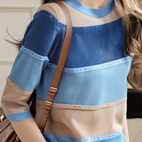 Three-quarter sleeve round neck colorful hollow knit top