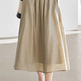 Linen button-up irregular design short sleeve shirt with A-line long skirt set