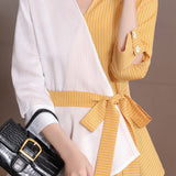 Irregular color-blocked shirt with bow tie details