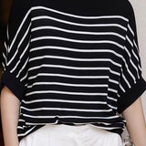 Versatile loose-fit striped short-sleeve knit top.