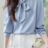 Elegant office-ready bow-tie blouse