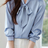 Elegant office-ready bow-tie blouse