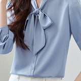 Elegant office-ready bow-tie blouse
