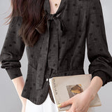 French Commuter V‑Neck Long‑Sleeve Blouse With Tie Detail And Polka‑Dot Print