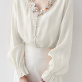 Elegant Lace Floral Flare‑Sleeve V‑Neck Blouse