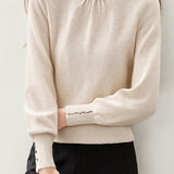 Elegant Knit Sweater With Ruffled Mock Neck And Bead Embellishment