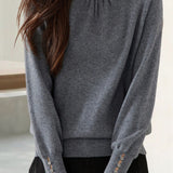 Elegant Knit Sweater With Ruffled Mock Neck And Bead Embellishment