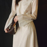 Chic Round Neck Dress with Diagonal Seams and Defined Waist