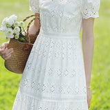 Solid color round neck hollow dress