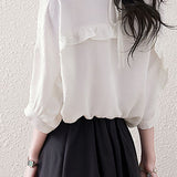 Solid color ruffle edge shirt