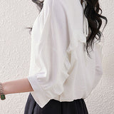 Solid color ruffle edge shirt
