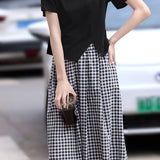 Side-slit short sleeve T-shirt with A-line plaid skirt set