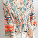 V-neck bell sleeve printed top