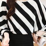 Striped batwing sleeve color block shirt