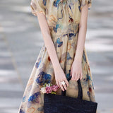 Lantern sleeve floral waist-defining A-line dress