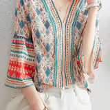 V-neck bell sleeve printed top