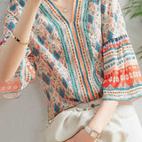V-neck bell sleeve printed top