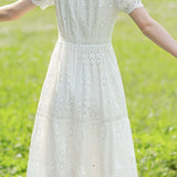 Solid color round neck hollow dress