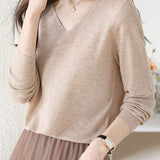 V-neck knitted sweater with hot-fixed rhinestones.