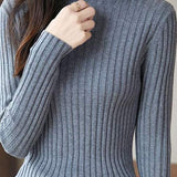 Slim ribbed half turtleneck sweater