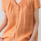 Casual V-neck gathered loose shirt.