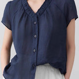 Casual V-neck gathered loose shirt.